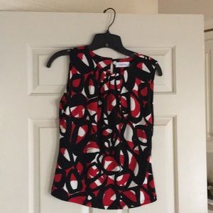 Sleeveless red black print top